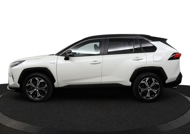 Toyota RAV4 2.5 Plug-in Hybrid AWD Bi-Tone Plus | Adaptive Cruise Control | Navigatie | Lederen Bekleding | Stoelverwarming | Stoelventilatie | Panoramadak | 1500 kg Trekgewicht |