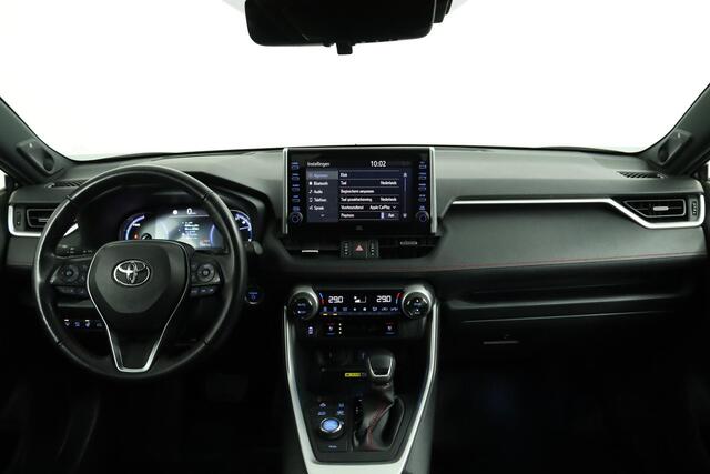 Toyota RAV4 2.5 Plug-in Hybrid AWD Bi-Tone Plus | Adaptive Cruise Control | Navigatie | Lederen Bekleding | Stoelverwarming | Stoelventilatie | Panoramadak | 1500 kg Trekgewicht |
