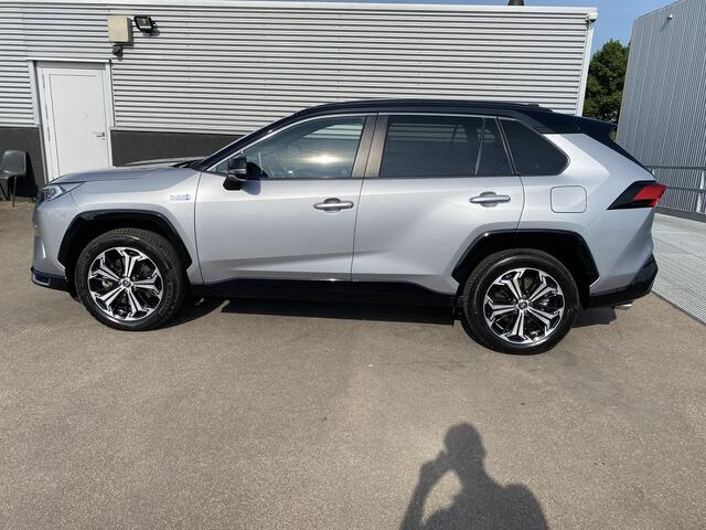 Toyota RAV4 2.5 Plug-in Hybrid AWD Bi-Tone Plus Schuif-/kanteldak, 360" Camera, Stoelkoeling+ verwarming, Dodehoekdetectie, JBL, Navigatie, HUD