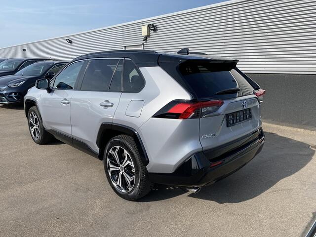 Toyota RAV4 2.5 Plug-in Hybrid AWD Bi-Tone Plus Schuif-/kanteldak, 360" Camera, Stoelkoeling+ verwarming, Dodehoekdetectie, JBL, Navigatie, HUD