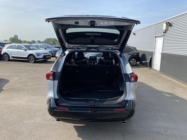 Toyota RAV4 2.5 Plug-in Hybrid AWD Bi-Tone Plus Schuif-/kanteldak, 360" Camera, Stoelkoeling+ verwarming, Dodehoekdetectie, JBL, Navigatie, HUD