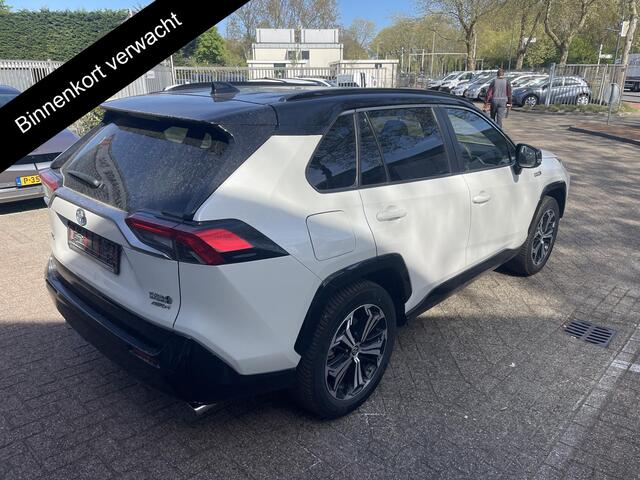 Toyota RAV4 2.5 Plug-in Hybrid AWD Bi-Tone Plus | 1500 KG trekgewicht | JBL Audio | Stoelverwarming & ventilatie | Memory Seats | Schuif-/Kanteldak | Navigatie