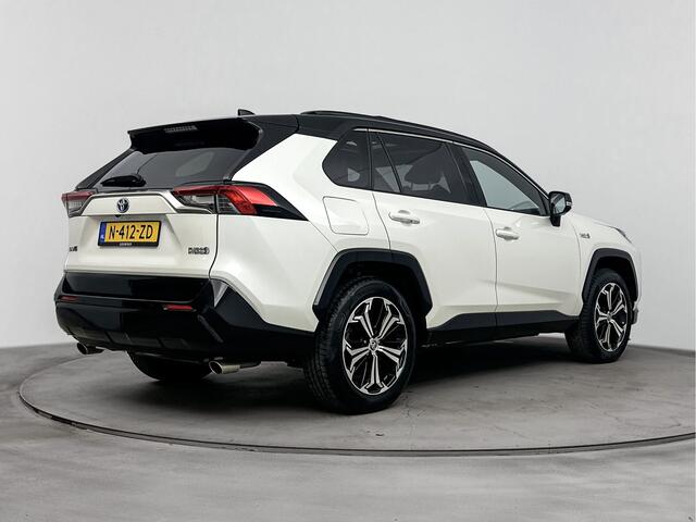Toyota RAV4 2.5 Plug-in Hybrid AWD Bi-Tone Plus | BTW | Schuif/kantel panoramadak | JBL | 360 Camera + camera binnenspiegel | Stoelventilatie | stoel+stuurverwarming | Memory Seat | Dodehoek detectie | Navigatie | Apple CarPlay/Android Aut