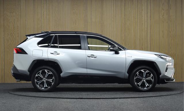 Toyota RAV4 2.5 Plug-in Hybrid AWD Style Bi-Tone | 306 pk | JBL Audio | Adaptive-cruise | 360° Camera | Clima | Apple Carplay & Android Auto | Stoel & Stuurverwarming | Navigatie | Keyless | Dodehoekdetectie