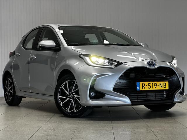 Toyota YARIS 1.5 Hybrid Dynamic/ Keyless/ 15'' LMV/ LED Koplampen/ DAB+/ Lane-Assist./ Camera/ Clima/ Cruise/ Elek. pakket/ Isofix/ Bluetooth/ Armsteun/ Multi. LEDER. Stuur/ Grootlicht Assist./ LED Mistl.