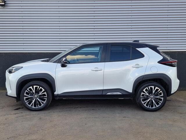 Toyota YARIS Cross 1.5 Hybrid Adventure CVT-Automaat Bi-Tone Parelmoer wit met zwart dak | Dodehoekdetectie | Achteruitrij camera| Stoelverwarming | Adaptive cruise control | Trekhaak | All season banden | Keyless | Parkeersensoren |