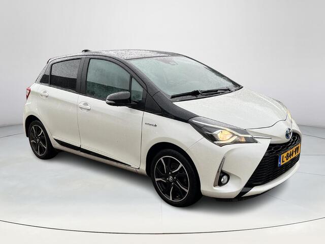 Toyota YARIS 1.5 Hybrid Bi-Tone | Parkeercamera | Stoelverwarming | Donker glas | Cruise control |