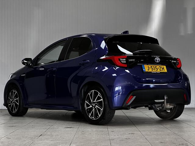 Toyota YARIS 1.5 Hybrid Dynamic/ Dealer Onderhouden!/ Trekhaak!/ Automaat/ LED Koplampen/ Apple+Android/ DAB+/ 16''LMV/ Grootlichtass./ Camera/ Clima/ Navi/ Cruise/ Bluetooth/ Multi.LEDER.Stuur/ Elek.Pakket/ Isofix/ Getint G