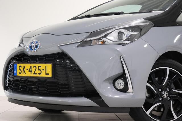 Toyota YARIS 1.5 Hybrid Bi-Tone Plus, Cruise Control, Pano, Camera, LM Velgen, Bluetooth, Navi!