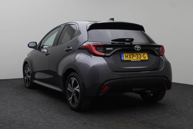 Toyota YARIS 1.5 Hybrid 115 Dynamic 2025 | INCL. BTW | Stoel & Stuurverwarming | Carplay | DAB Radio | Adaptive Cruise Control | Achteruitrij Camera | Draadloze Telefoon Lader | Stuurwiel Bediening | Lichtmetalen Velgen | Climate Control | Origineel Nederlands NAP