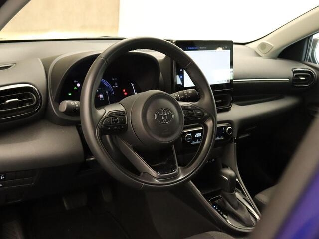 Toyota YARIS 1.5 Hybrid 115 First Edition - ORIGINEEL NEDERLANDSE AUTO - AFKOMSTIG VAN 1E EIGENAAR - NAVIGATIE - CAMERA - CLIMATE CONTROL - ARMSTEUN VOOR - APPLE CARPLAY/ ANDROID - MISTLAMPEN VOOR - 16 INCH LICHT METALEN VELGEN - LICHT EN REGENSENSOR - KEYLESS ENTRY/
