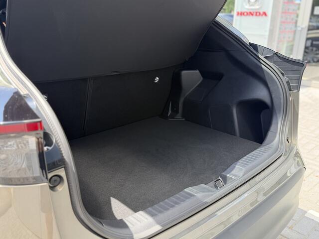 Toyota YARIS Cross 1.5 Hybrid 115 First Edition | GEEN AFLEVERKOSTEN | Navigatie, Camera, Draadloze telefoonlader