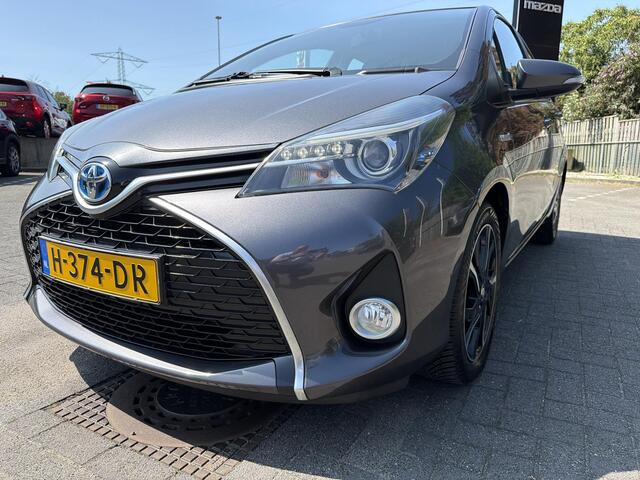 Toyota YARIS 1.5 Hybrid Orange Sport | Achteruitrijcamera | Navigatie | Cruise control |