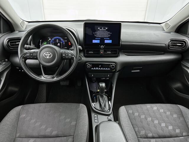 Toyota YARIS 1.5 Hybrid 115 Dynamic Comfort Pack | BTW voertuig | Dodehoek detectie | Parkeersensoren voor+achter | Stoel+stuurverwarming | Elektrisch verstel/inklapbare buitenspiegels | Draadloze telefoonlader | Navigatie | Apple CarPlay/A