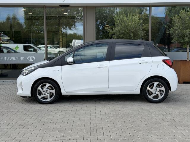 Toyota YARIS 1.5 Hybrid Trend Bi-Tone | Leer | Navigatie | LM Velgen