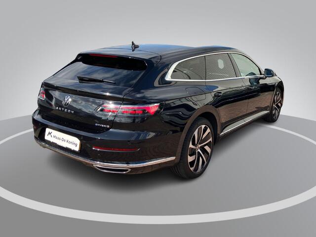 Volkswagen Arteon Shooting Brake 1.4TSIe Hybrid 160KW/218PK DSG R-Line Panoramadak · Leer · 360°Camera + Parkeersensoren · Stoelverwarming · Dodehoeksensor · Elektrische stoelverstelling ·