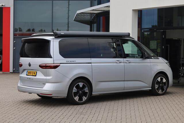 Volkswagen CALIFORNIA 180KW-245PK, Hybride, Camper, Standkachel, Keuken met Koelkast, gaspit, stromend water, 230V, elektrisch hef dak, Luifel, slaapmogelijkheid 2 persoon bed, 4 zitplaatsen, watertank, handdouche, vele opberg mogelijkheden,