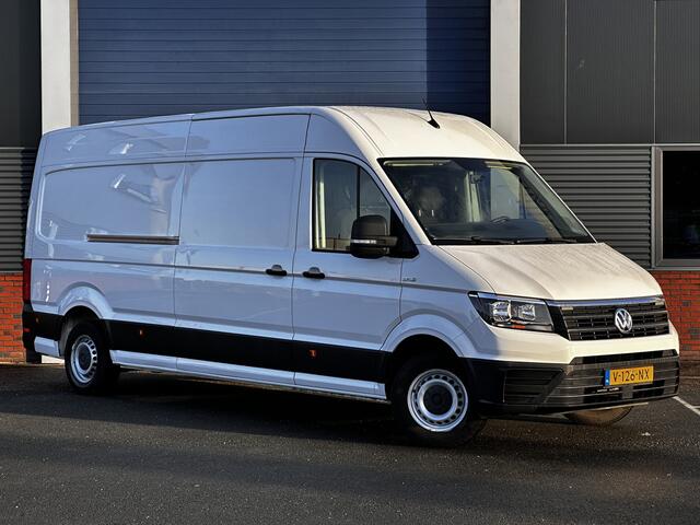 Volkswagen CRAFTER 35 2.0 TDI L4H3 Highline/ D-Riem verv: 151.000 KM!/ Zij-Schuifdeur Rechts/ Trekhaak/ Camera/ Apple + Android/ DAB+/ Navi/ Airco/ Cruise/ Elek. pakket/ Bluetooth/ Armsteun/ Dagrijverl./ Getint glas.