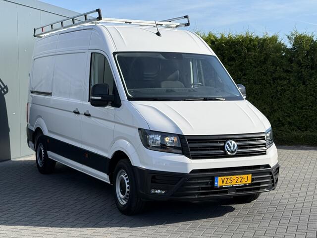 Volkswagen CRAFTER 2.0 TDI 141 PK / L3H3 / 2x SCHUIFDEUR / IMPERIAAL + LADDER / 3 TONS TREKHAAK / CAMERA / 3-ZITS / VERWARMDE VOORRUIT
