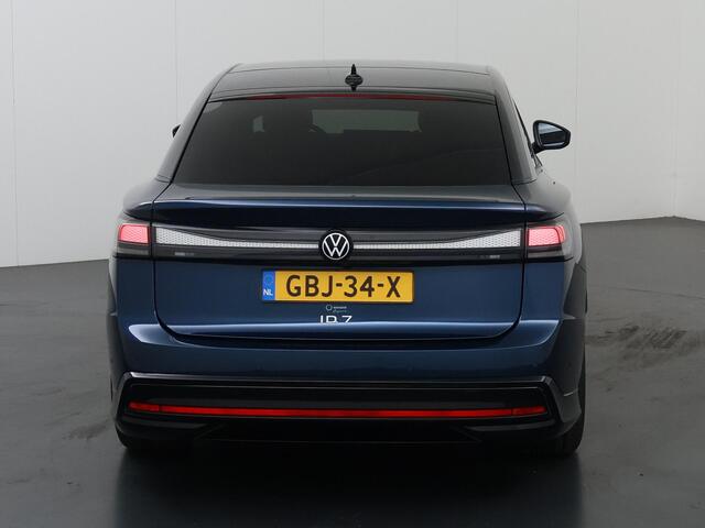 Volkswagen ID ID.7 Pro Business 77 kWh | SOH 96% | Warmtepomp | Panoramadak | Head Up | Stoelverwarming | Parkeercamera 360° | Cruise Control Adaptief | 20" Lichtmetalen Velgen | Elektr. verstelb. bestuurdersstoel met geheugen |