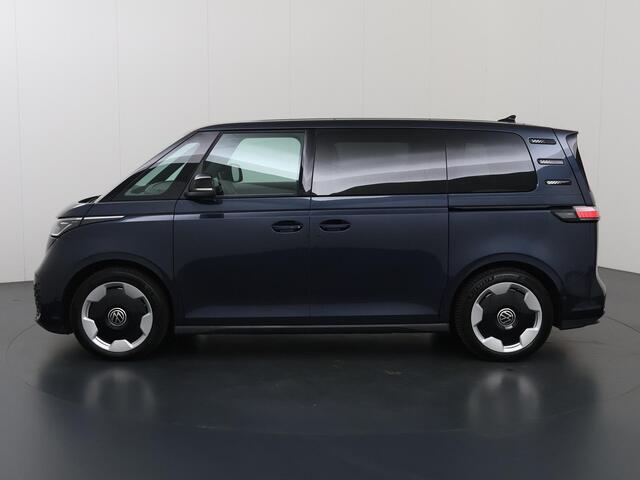 Volkswagen ID. Buzz Pro Advantage 77 kWh | SOH 96% | Elektrisch verstelbare Comfortstoelen | Navigatie | Camera | DAB | Stoelverwarming | DAB | Apple CarPlay/Android Auto | Elektrische schuifdeuren | Trekhaak | 5 Persoons | Ele. kofferdeksel |