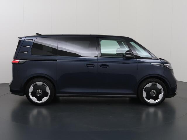 Volkswagen ID. Buzz Pro Advantage 77 kWh | SOH 96% | Elektrisch verstelbare Comfortstoelen | Navigatie | Camera | DAB | Stoelverwarming | DAB | Apple CarPlay/Android Auto | Elektrische schuifdeuren | Trekhaak | 5 Persoons | Ele. kofferdeksel |