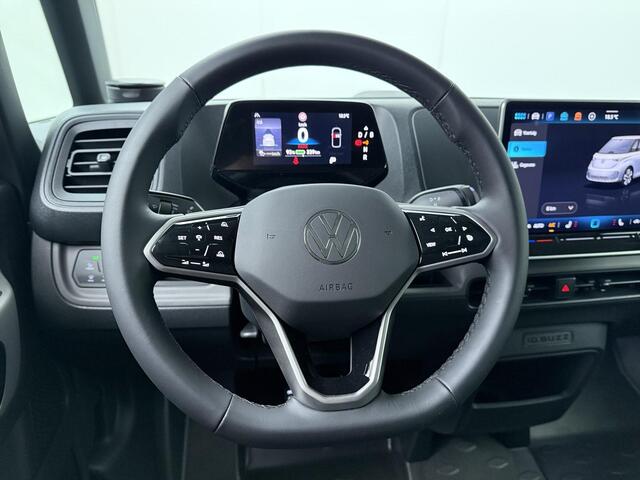 Volkswagen ID. Buzz Cargo Bedrijfswagens Bulli Edition Elektromotor 210 kW (286 pk) 2988 mm | Alarm klasse 3 | Climate control | 19 inch 'Tilburg' velgen | 360° camera | Stuurwiel verwarmd | Trekhaak elektrisch | Multimedia pakket plus | Parkeer pakket | Assistentiepakket | LED pakket | Zijwandbekleding | Schuifdeur links + rechts |