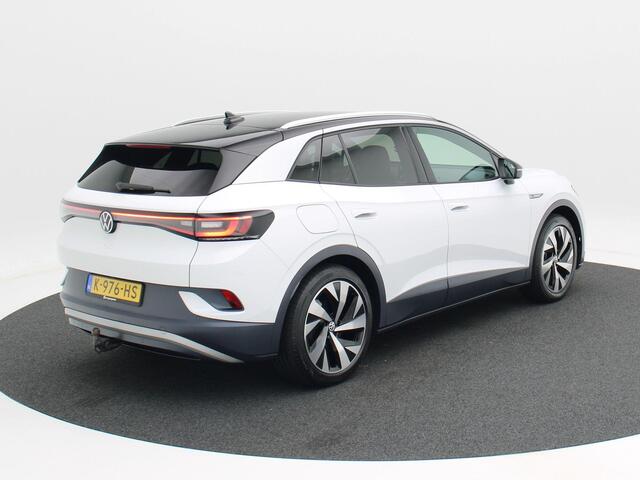 Volkswagen ID.4 First 77 kWh 205 Pk | LED-verlichting | Leder/Alcantara | Adaptive Cruise | Camera | CarPlay | Zwarte Hemel | 20 Inch | 40.702 Km