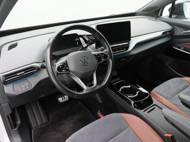 Volkswagen ID.4 First 77 kWh 205 Pk | LED-verlichting | Leder/Alcantara | Adaptive Cruise | Camera | CarPlay | Zwarte Hemel | 20 Inch | 40.702 Km