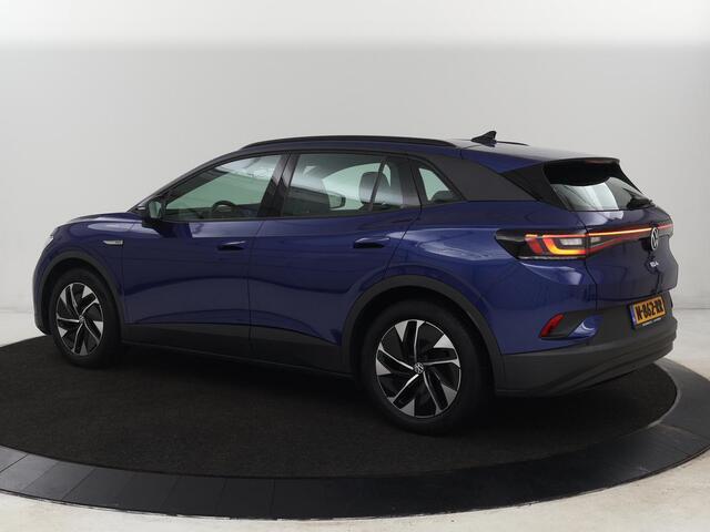 Volkswagen ID.4 Pro 77 kWh | Trekhaak | Stoelverwarming | Warmtepomp | Sfeerverlichting | Stuurverwarming | Carplay | Adaptive cruise | Keyless | Camera | Navigatie | Full LED