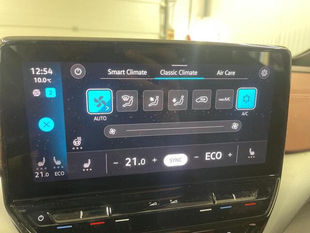 Volkswagen ID.4 Business 77 kWh Navigatie Apple Carplay/Android Auto Camera Parkeersensoren Adaptive Cruise Control Stoel- en stuurverwarming Full Led Climate Control