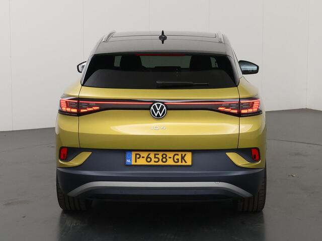 Volkswagen ID.4 Max 77 kWh | SOH 92% | Warmtepomp | IQ LED Matrix | Trekhaak | ErgoActive Stoelen | Stoel/stuurverwarming | Rijassistent-Systeem | Panoramadak | Navigatie Discover Pro | Adaptieve Cruise Control | Camera | HUD |