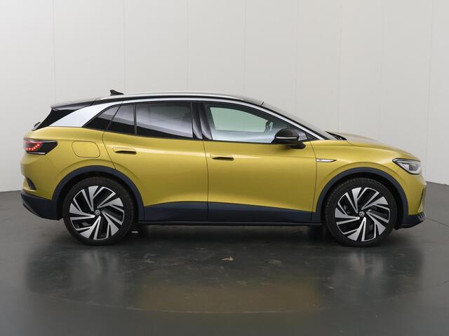 Volkswagen ID.4 Max 77 kWh | SOH 92% | Warmtepomp | IQ LED Matrix | Trekhaak | ErgoActive Stoelen | Stoel/stuurverwarming | Rijassistent-Systeem | Panoramadak | Navigatie Discover Pro | Adaptieve Cruise Control | Camera | HUD |