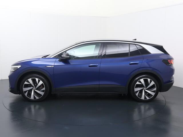 Volkswagen ID.4 First 77 kWh | 204 PK | SoH 87% | Navigatiesysteem | Adaptive cruise control | Verwarmde voorstoelen + voorruit | 20" LM velgen |