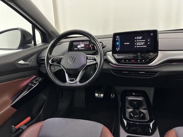 Volkswagen ID.4 First 77 kWh [ 3-Fase ] {SOH-83%} (INCL.BTW) *LEATHER-MICROFIBRE | FULL-LED | ADAPTIVE-CRUISE | HEATED-COMFORTSEATS | DIGI-COCKPIT | AMBIENT-LIGHT | NAVI-FULLMAP | PDC | TOWBAR | PRIVACY-GLASS | CAMERA | 20''ALU*
