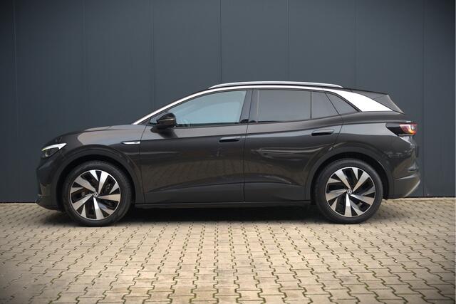Volkswagen ID.4 First 77 kWh | Stoelverwarming | Stuurverwarming | Trekhaak | Warmtepomp | Adaptive Cruise Control | Navigatie | Apple Carplay | Keyless | Camera | Parkersensoren |