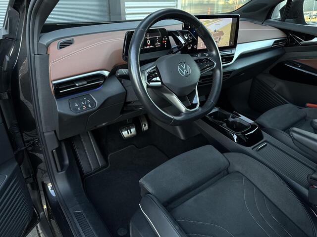 Volkswagen ID.4 Max 77 kWh ?SOH 90% Rijtest ?Panoramadak ?Warmtepomp ?Matrix LED ?Head-Up ?Half Leder Alcantara ?Sfeerverlichting ?Navigatie ?360º Camera ?Lichtmetaal 21" ?Parkeersensoren ?Trekhaak