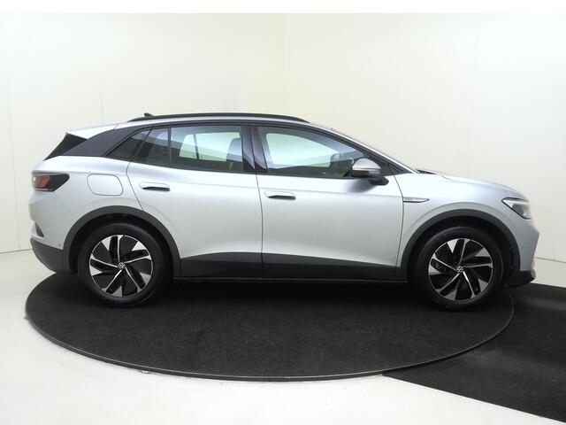 Volkswagen ID.4 Pro Business 77 kWh | SoH 93% | Parkeerassistent | Luxe bekleding | Adaptieve cruise control | Achteruitrijcamera | Navigatie | Stoelverwarming | CarPlay |
