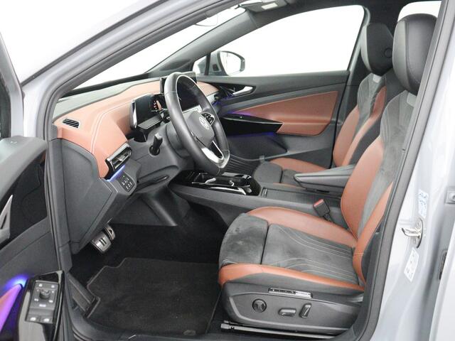 Volkswagen ID.4 Tech 77 kWh | SOH 92,2% | Panorama | 360 Camera | Head up | Virtual cockpit | Sfeerverlichting | Stoel/Stuurverwarming | Adaptive cruise | Carplay | Traffic assist | Climate control | Half leder/velours