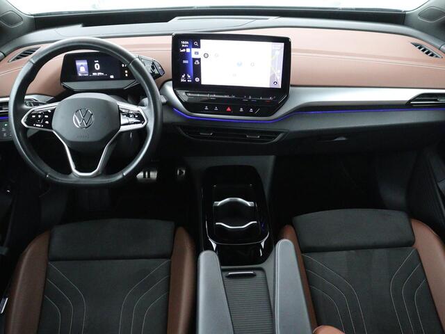 Volkswagen ID.4 Tech 77 kWh | SOH 92,2% | Panorama | 360 Camera | Head up | Virtual cockpit | Sfeerverlichting | Stoel/Stuurverwarming | Adaptive cruise | Carplay | Traffic assist | Climate control | Half leder/velours