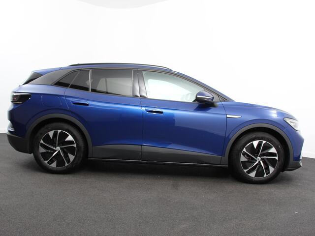 Volkswagen ID.4 Business 77 kWh SOH 83% Leder Navigatie 19" Lichtmetalen Velgen Apple Carplay/Android Auto Climate Control Warmtepomp Stoelverwarming Led Parkeer sensoren