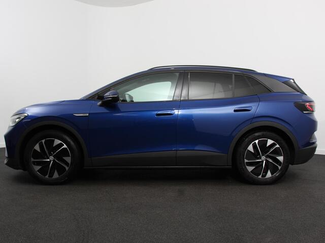 Volkswagen ID.4 Business 77 kWh SOH 83% Leder Navigatie 19" Lichtmetalen Velgen Apple Carplay/Android Auto Climate Control Warmtepomp Stoelverwarming Led Parkeer sensoren