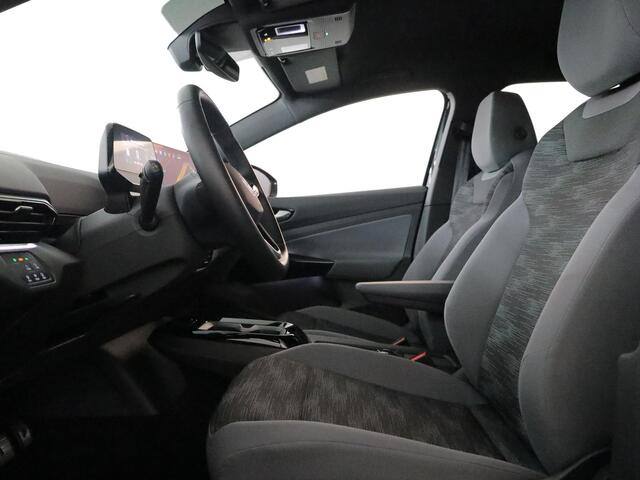 Volkswagen ID.4 Pro Business 79 kWh 286PK | 5 jaar fabrieksgarantie | Navigatie | Warmtepomp | Trekhaak | Keyless entry |