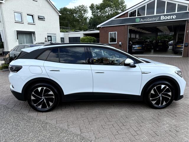 Volkswagen ID.4 Family 77 kWh SOH 91.7%, Panoramadak, Trekhaak, Camera, Stoelverwarming