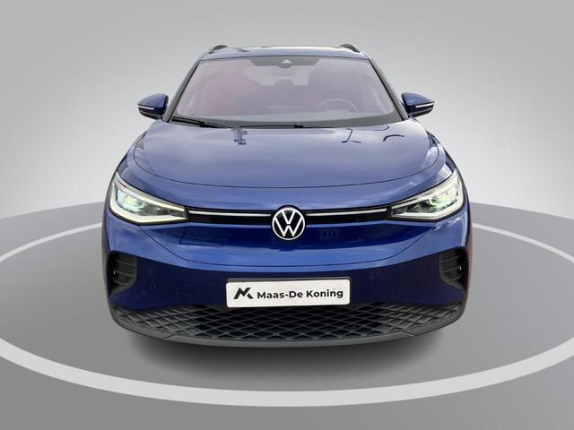 Volkswagen ID.4 Pro Advantage 77kWh 128KW/174PK · Apple Carplay/Android Auto · Stoelverwarming · Parkeersensoren · Fabrieksgarantie t/m 28-12-2027 of 100.000Km