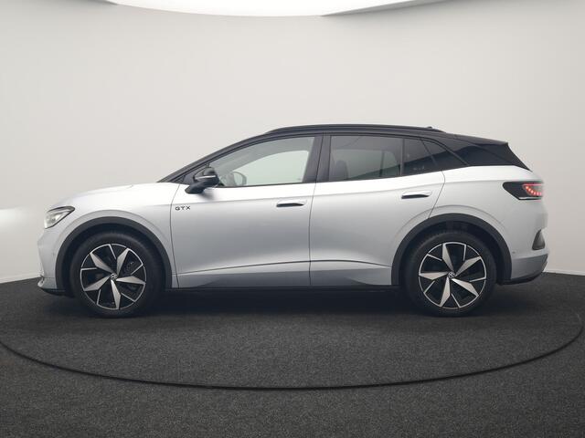Volkswagen ID.4 GTX 4Motion 77 kWh 300pk Dealer O.H. | Trekhaak Af Fabriek | Panodak | Adaptive Cruise | Camera | IQ Light | Sportstoelen & Stuur Verwarmd | Keyless | Sfeerverlichting | Apple Carplay | Navigatie | DAB | 20"L.M |