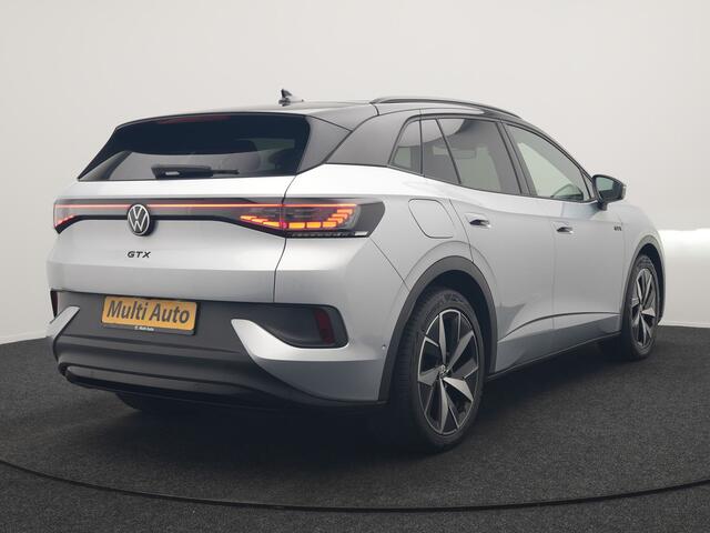 Volkswagen ID.4 GTX 4Motion 77 kWh 300pk Dealer O.H. | Trekhaak Af Fabriek | Panodak | Adaptive Cruise | Camera | IQ Light | Sportstoelen & Stuur Verwarmd | Keyless | Sfeerverlichting | Apple Carplay | Navigatie | DAB | 20"L.M |