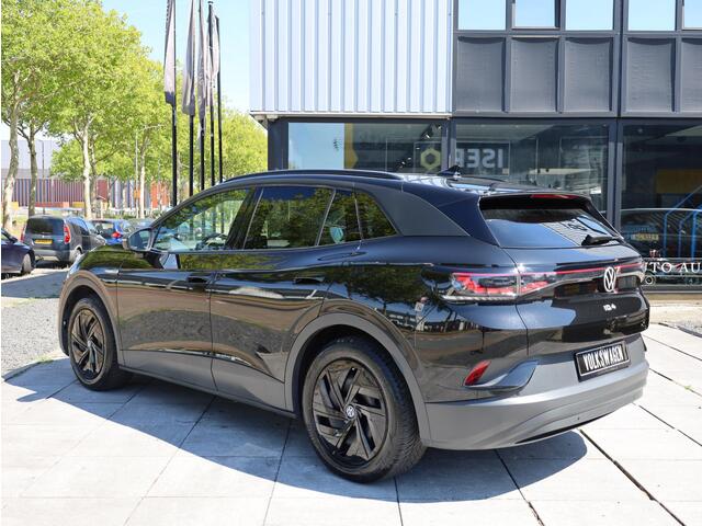 Volkswagen ID.4 Pro Business 77 kWh 150KW | Warmtepomp | Panodak | 360° | Head-up | Elektrische kofferklep |