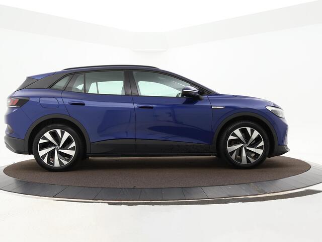 Volkswagen ID.4 Pro Business Advantage 77 kWh 204pk · SOH 95,8% · Inklap. Trekhaak · Warmtepomp · Stuur- & Stoelverwarming · 20"Velgen · ACC · Apple/Android Car Play ·