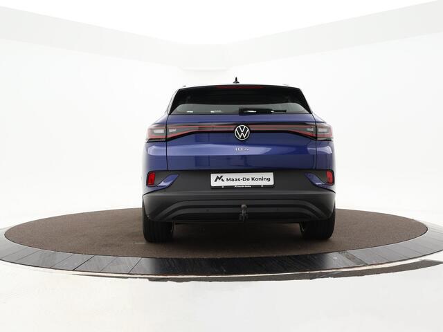Volkswagen ID.4 Pro Business Advantage 77 kWh 204pk · SOH 95,8% · Inklap. Trekhaak · Warmtepomp · Stuur- & Stoelverwarming · 20"Velgen · ACC · Apple/Android Car Play ·